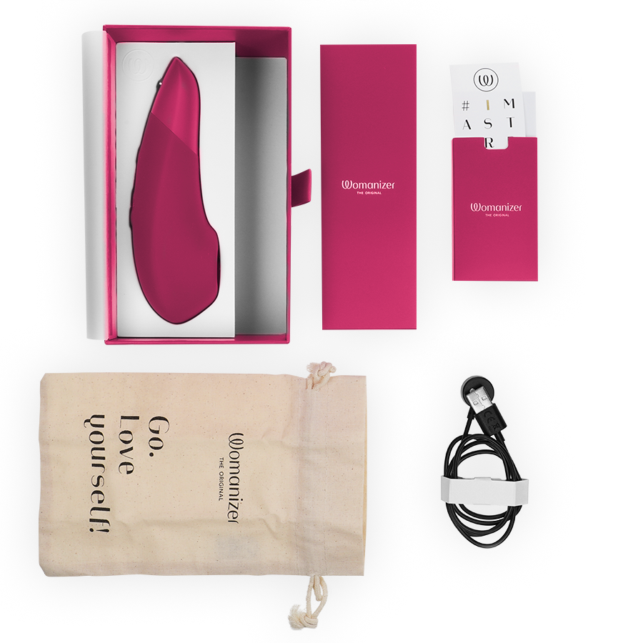 Womanizer Enhance stimolatore clitoride rosa vibrante aria