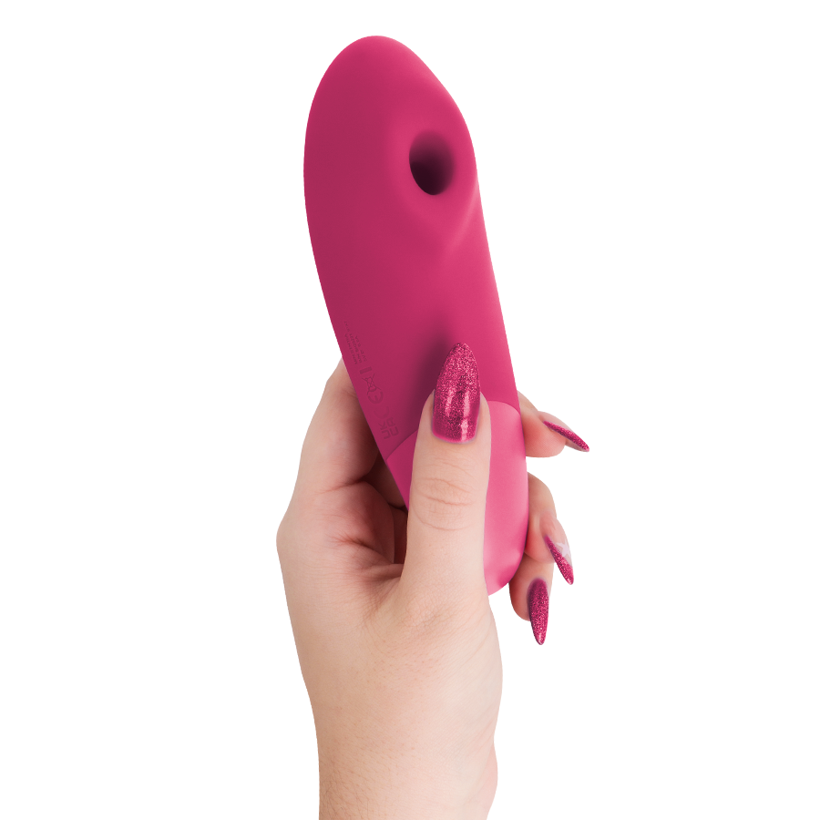 Womanizer Enhance stimolatore clitoride rosa vibrante aria