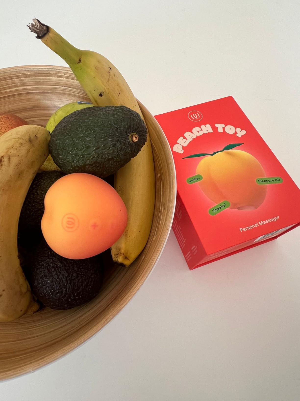 Womanizer Peach succhia clitoride 14 intensità impermeabile