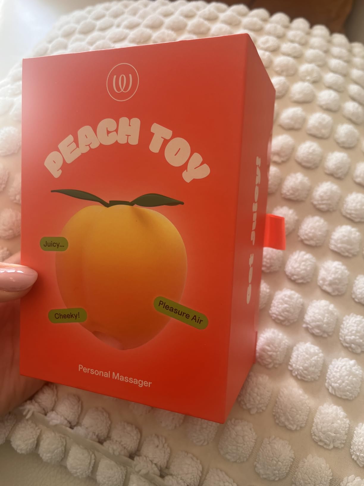 Womanizer Peach succhia clitoride 14 intensità impermeabile