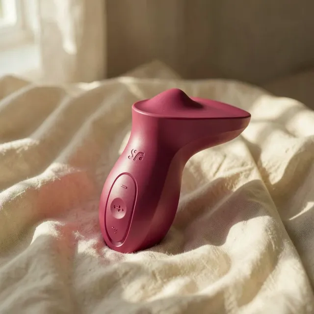 Satisfyer Exciterrr stimolatore clitoride fucsia rotante