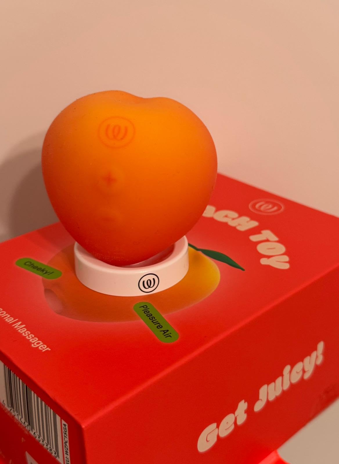 Womanizer Peach succhia clitoride 14 intensità impermeabile
