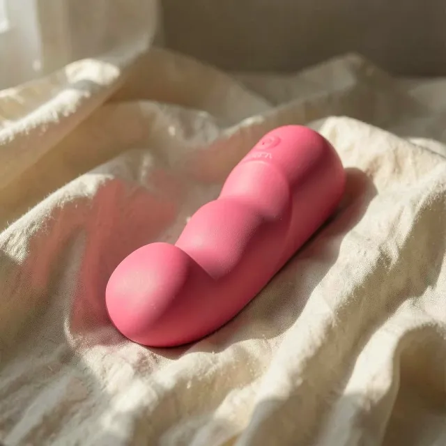 CalExotics Pixies Curvy vibratore rosa ricaricabile