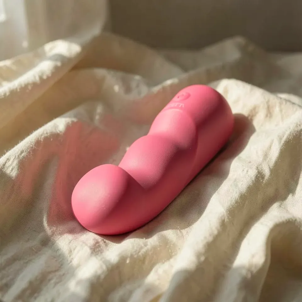 CalExotics Pixies Curvy vibratore rosa ricaricabile