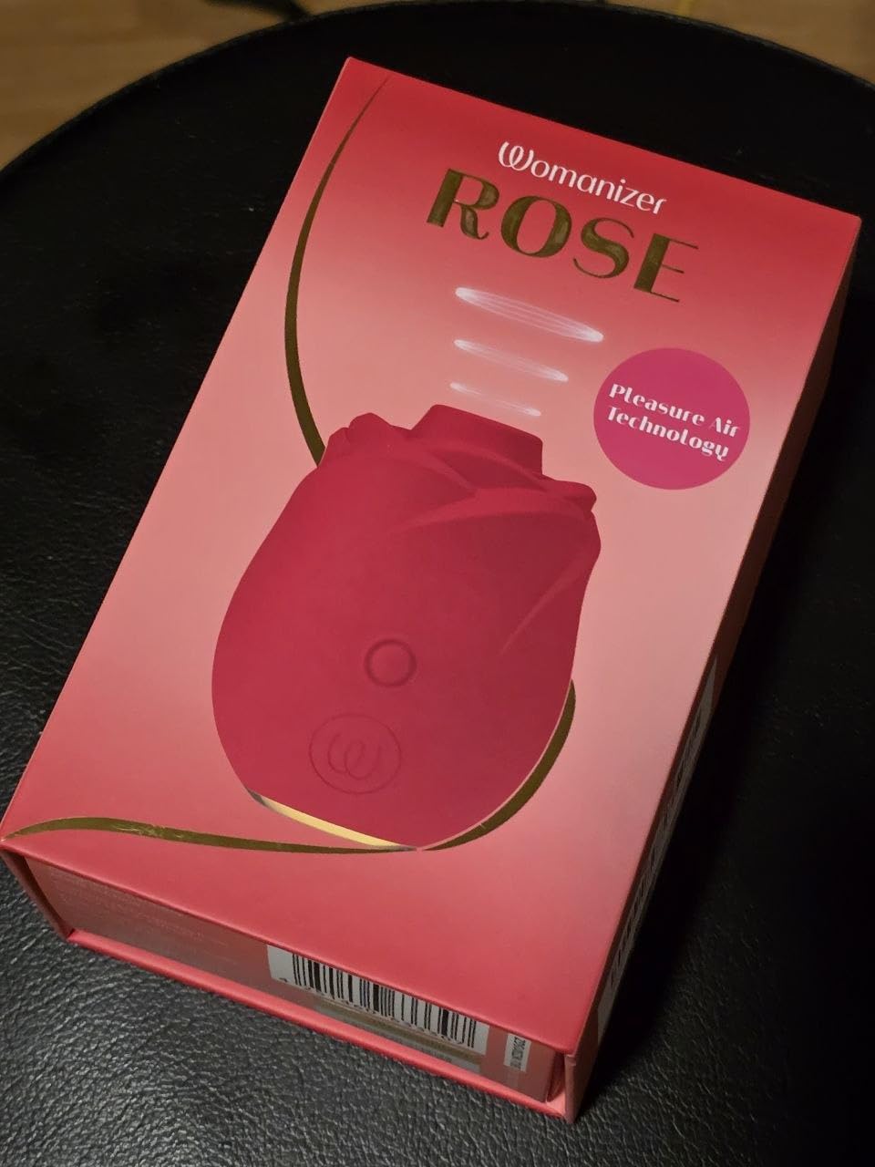 Womanizer Rose succhia clitoride rosso ricaricabile