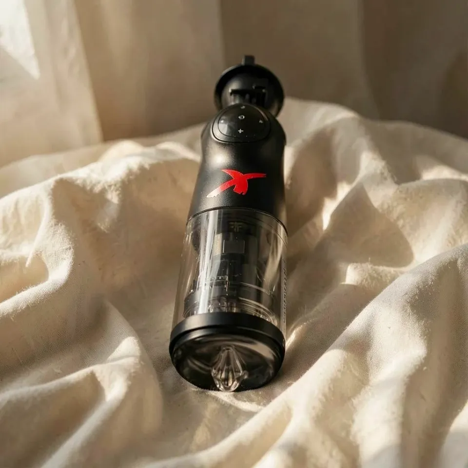PDX Elite Mega-Bator Deluxe masturbatore rotazione e spinta