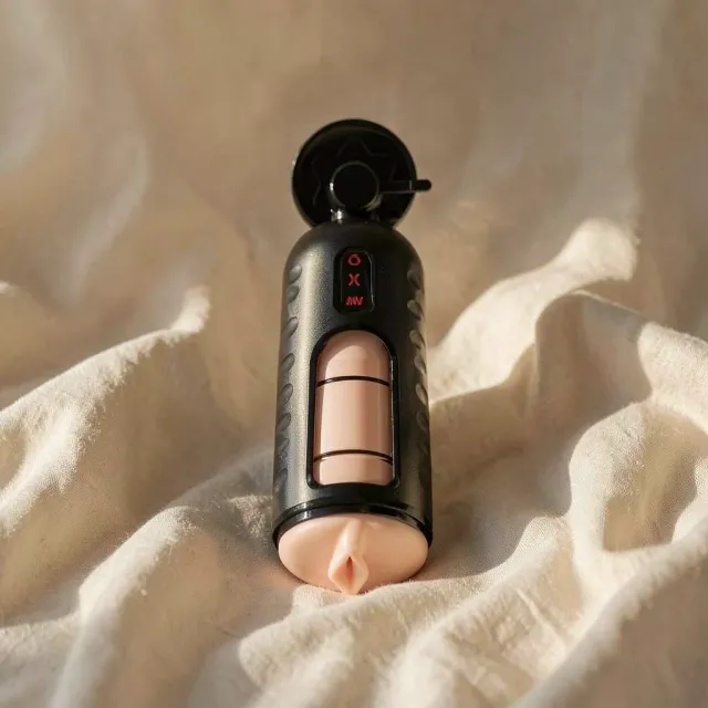 PDX Elite Mega Milker masturbatore vibrante a compressione