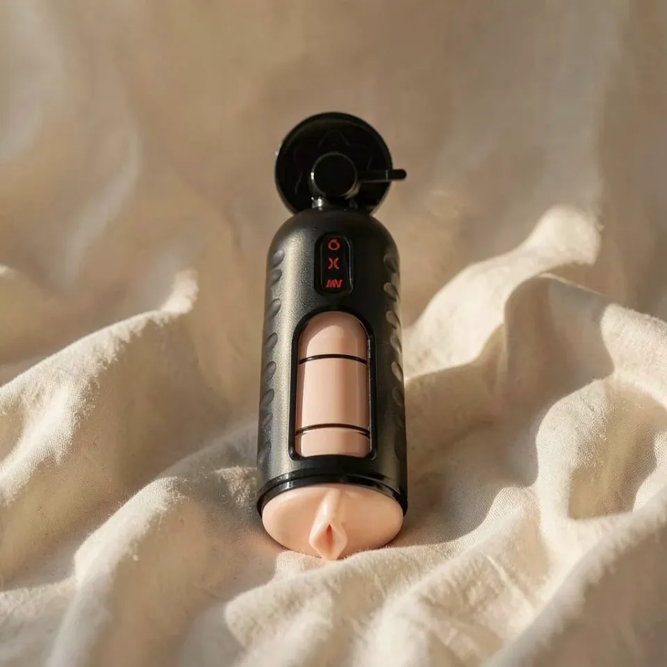 PDX Elite Mega Milker masturbatore vibrante a compressione
