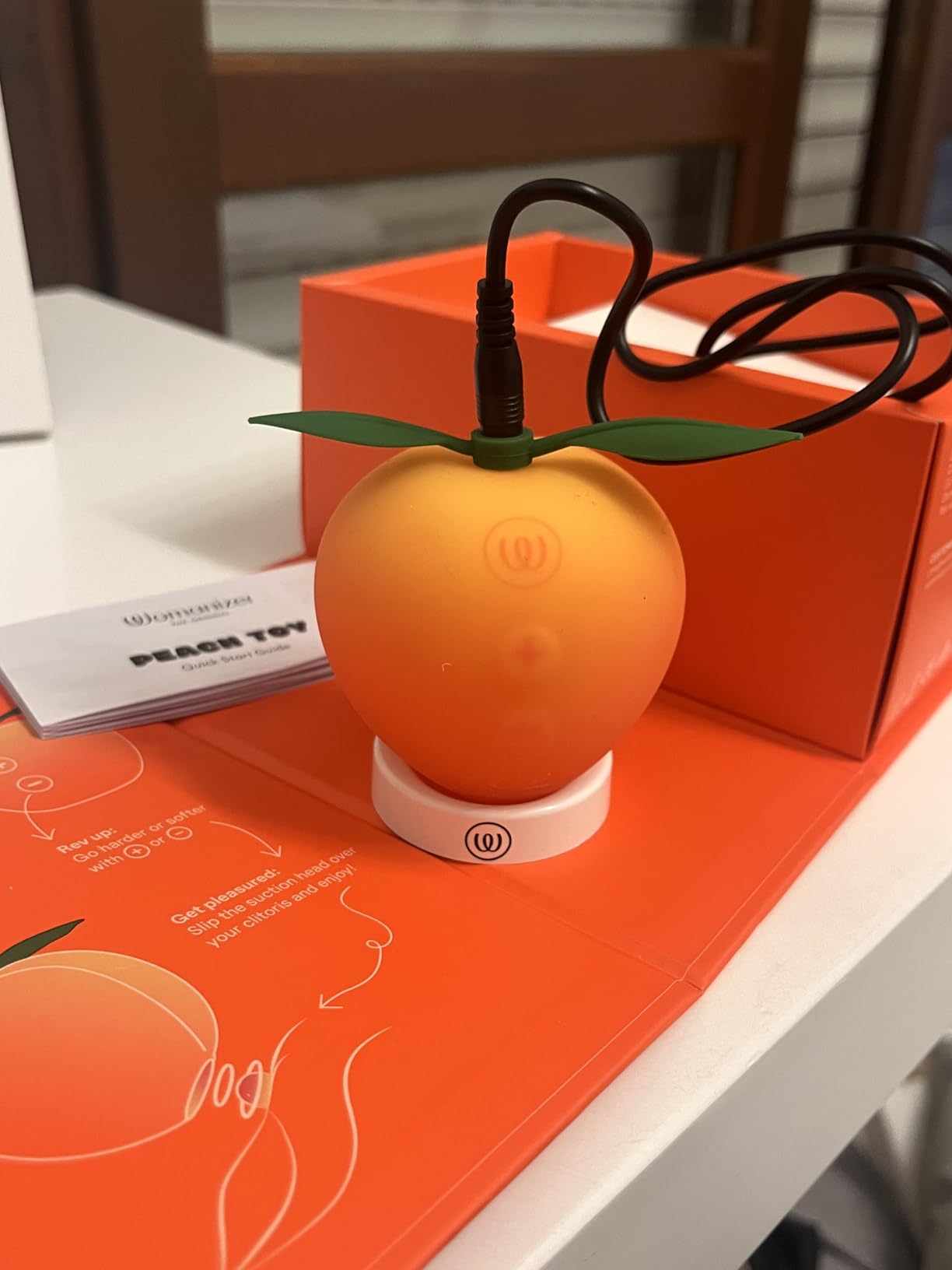 Womanizer Peach succhia clitoride 14 intensità impermeabile